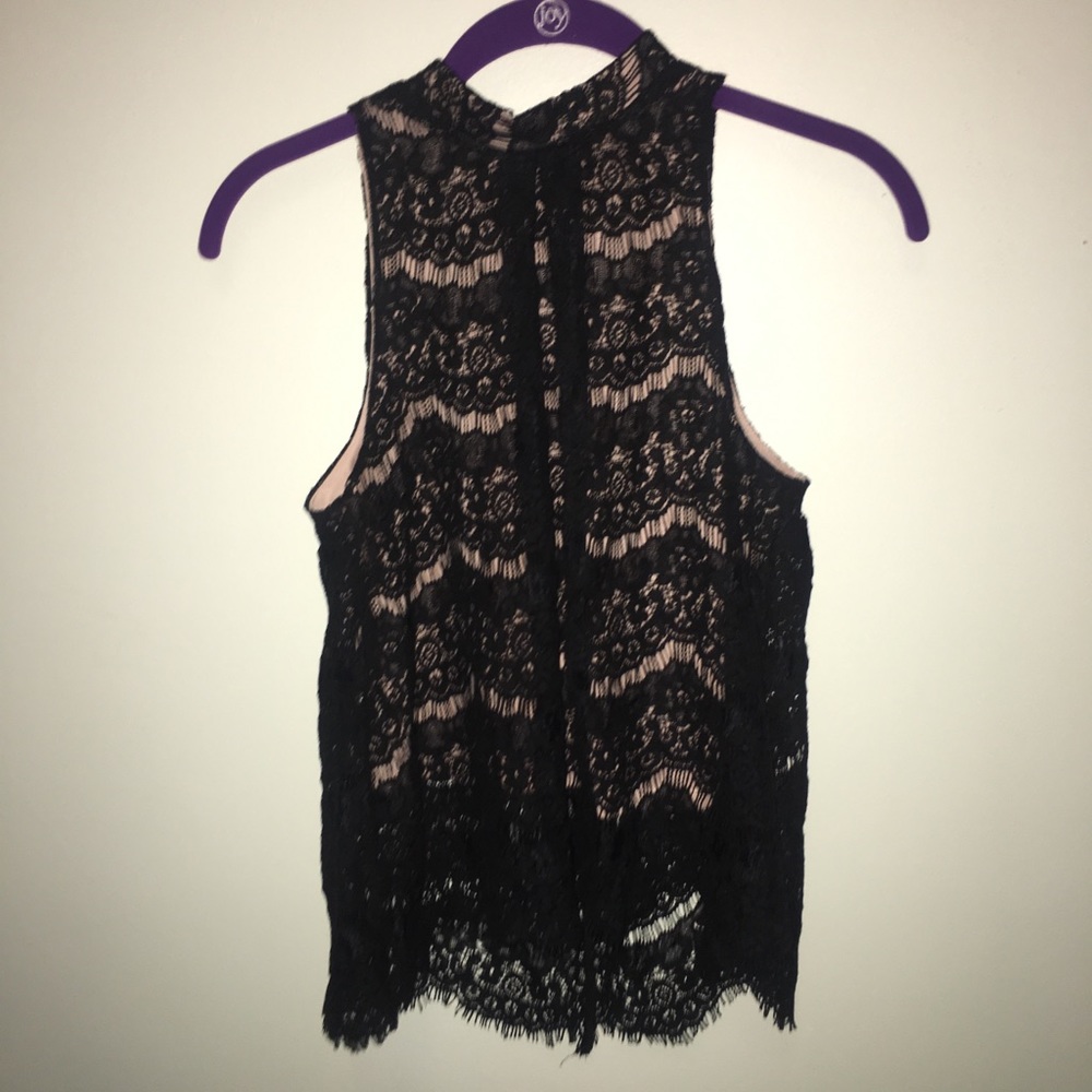 Black top with cream tank top attached